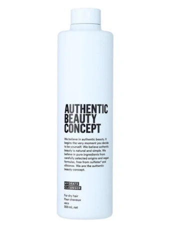 Botella de limpiador hidratante Authentic Beauty Concept para cabello seco con diseño minimalista en blanco sobre fondo blanco