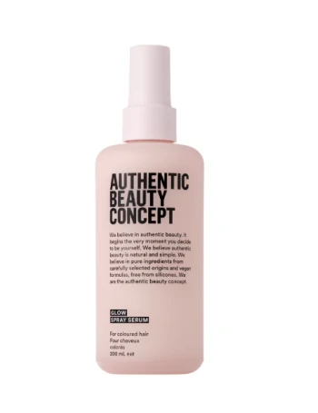 Botella de spray sérum Authentic Beauty Concept para cabello teñido con diseño minimalista en tono rosado sobre fondo blanco